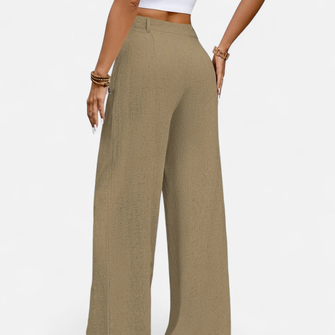 Navacava pleated trousers fabric detail — structured elegant drape