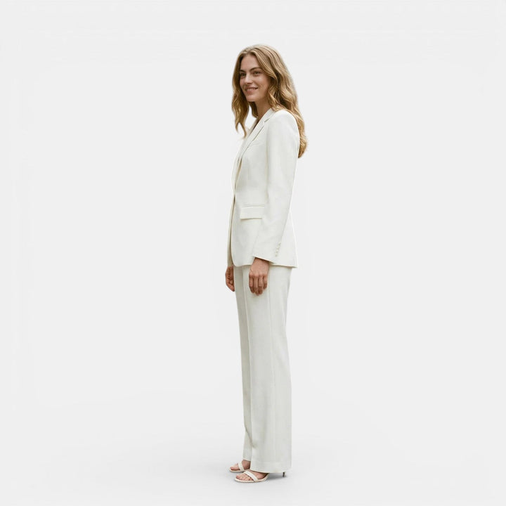 Navacava tailored suit in beige — classic refined wardrobe investment
