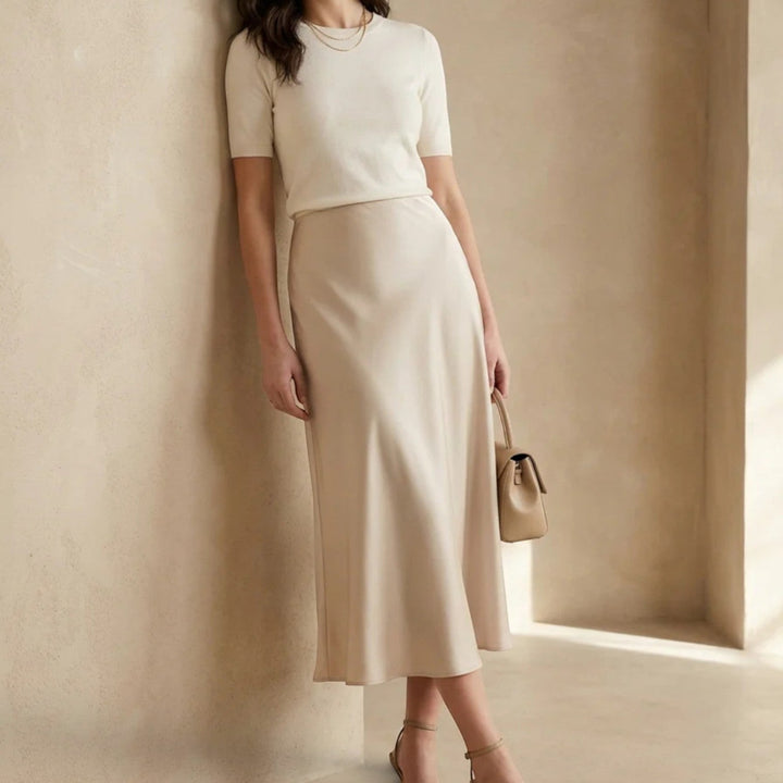Navacava silk midi skirt front view — high-waist refined silhouette
