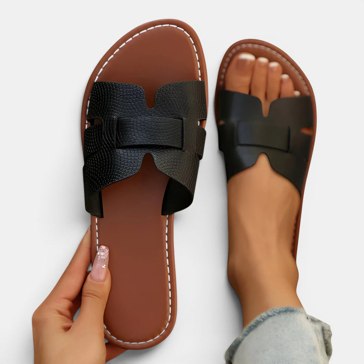 Navacava cushioned slides back view — clean minimalist silhouette
