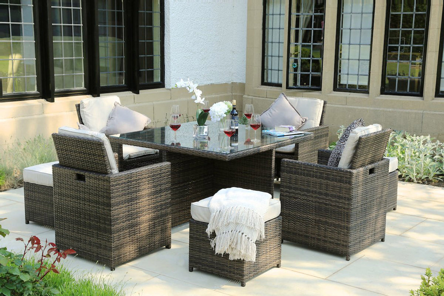 Brown 9-Piece Square Outdoor Dining Set with Beige Cushions 101" X 49" X 45"